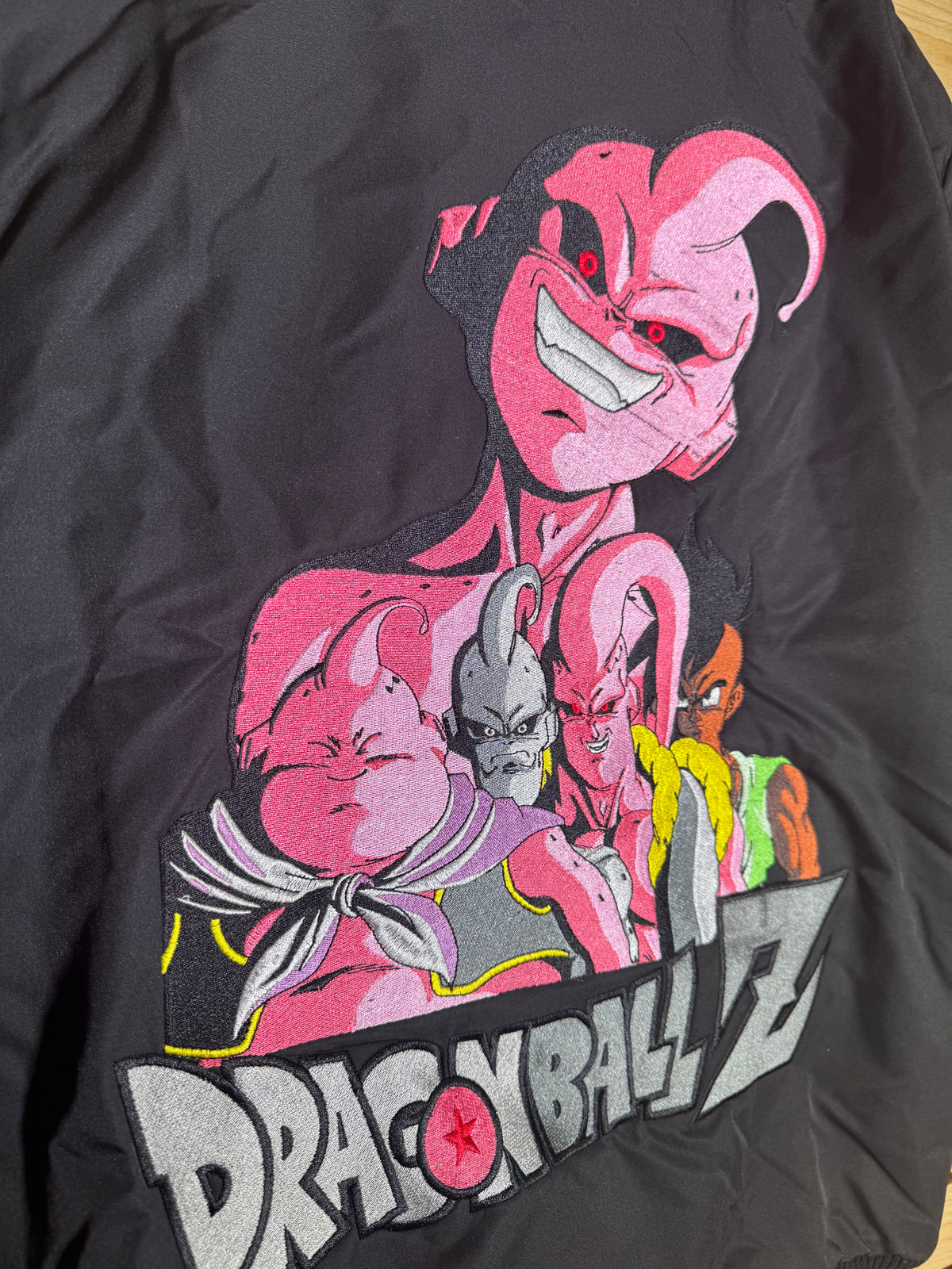 Black and White Varsity Jacket - Pink Shenron Embroidery Front - Majin Buu Embroidery Back